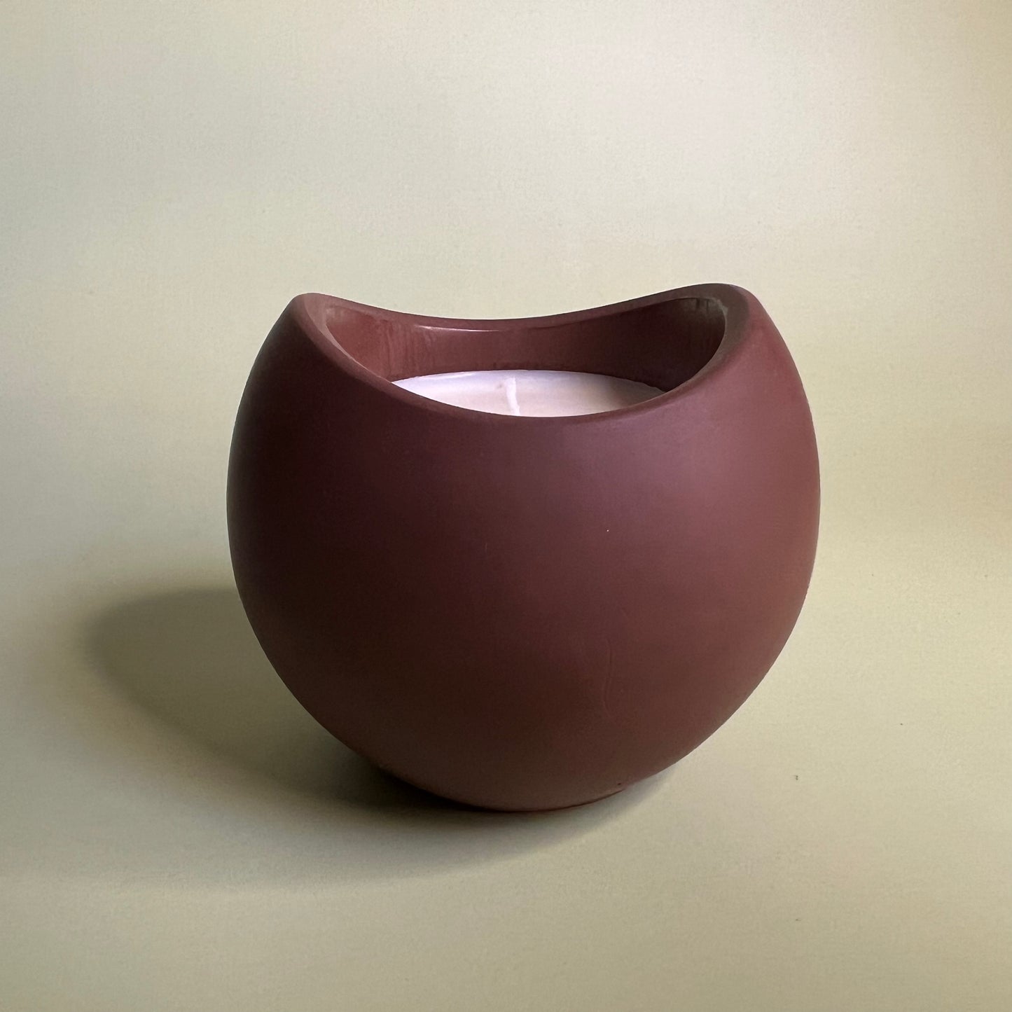 Candle in a Wave Shaped Container