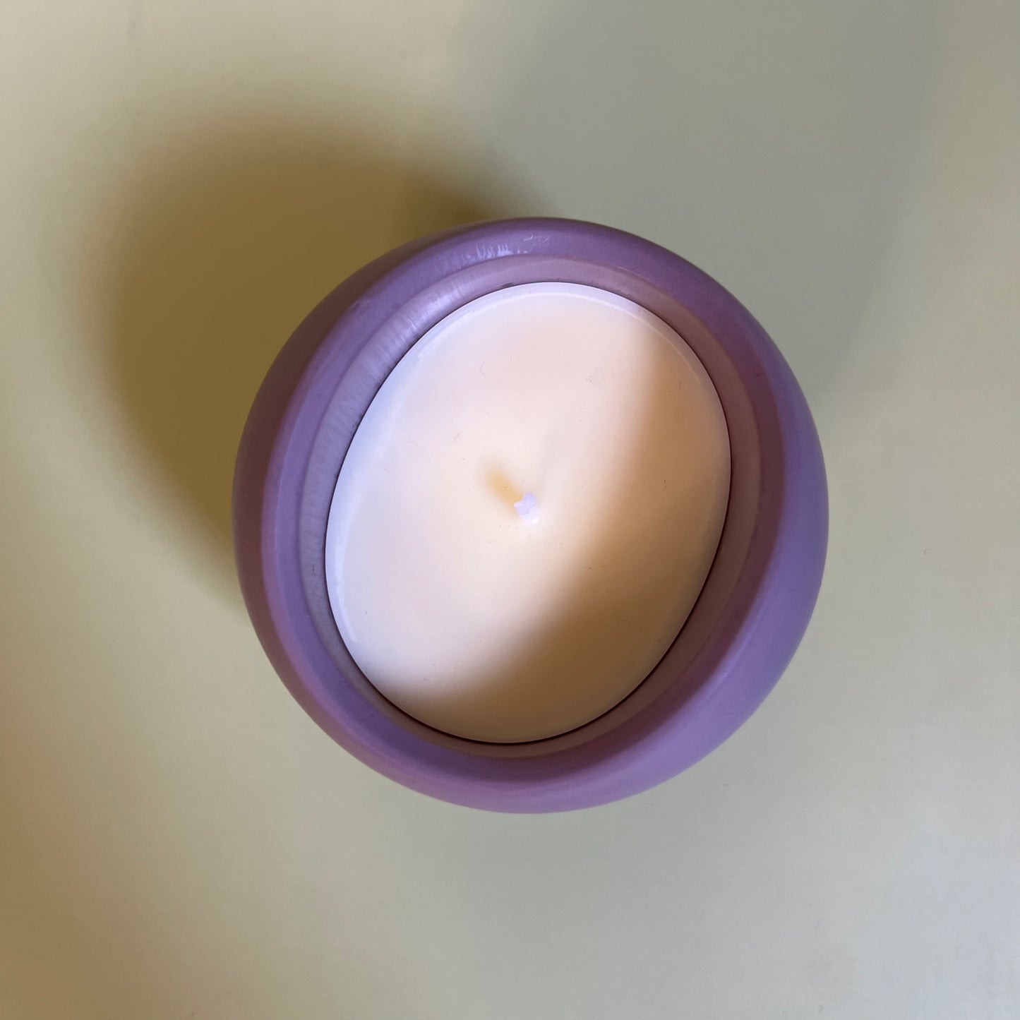 Candle in a Wave Shaped Container