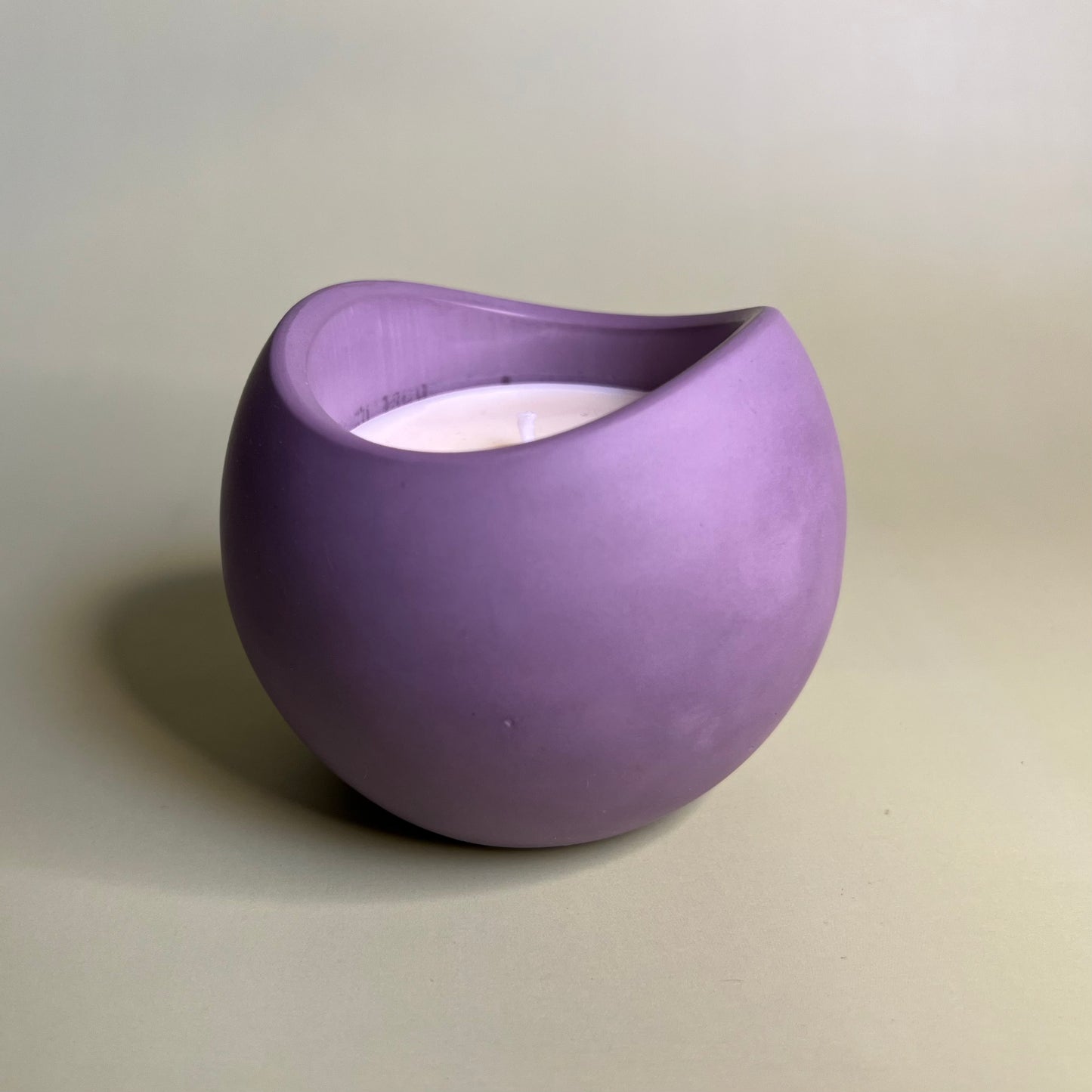 Candle in a Wave Shaped Container