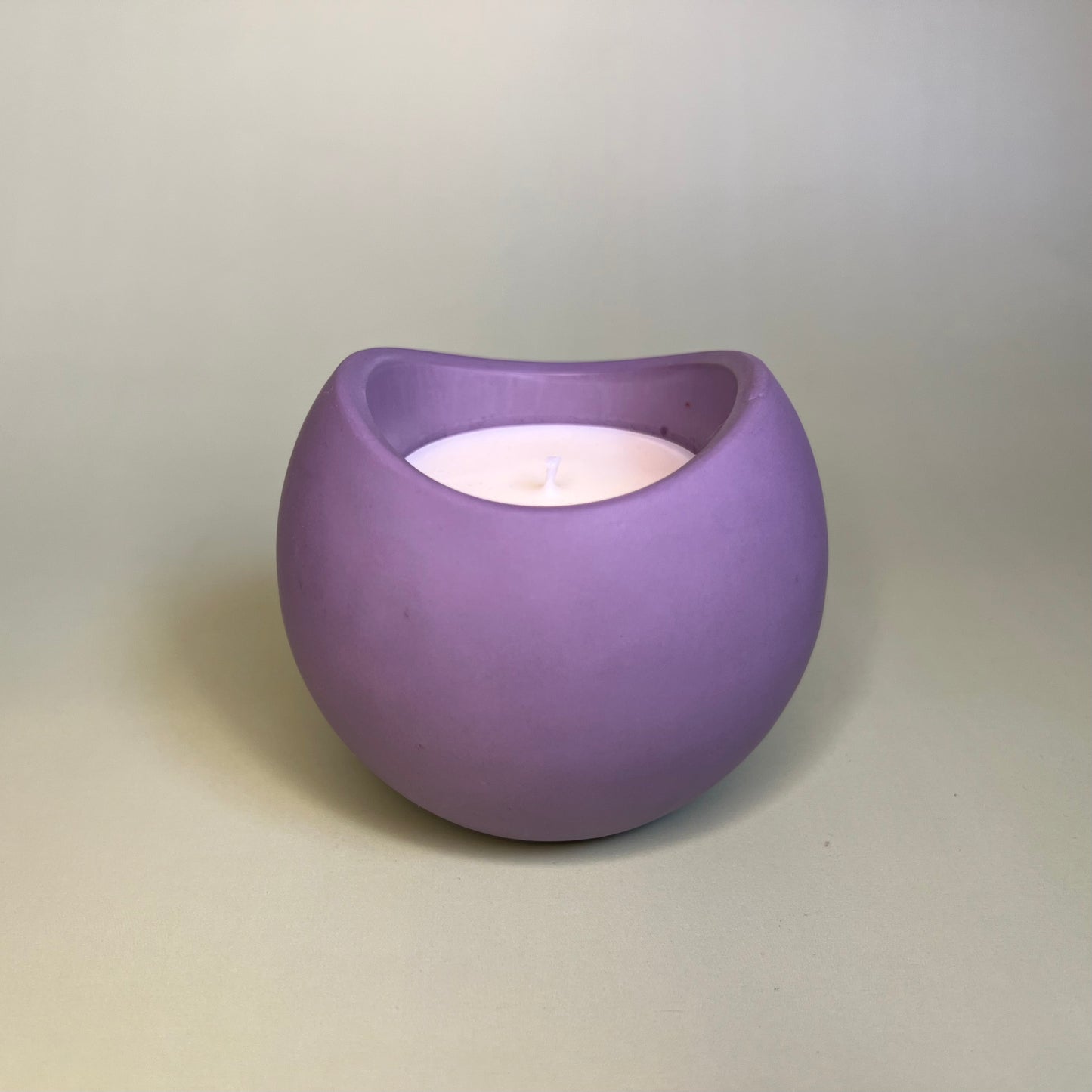 Candle in a Wave Shaped Container