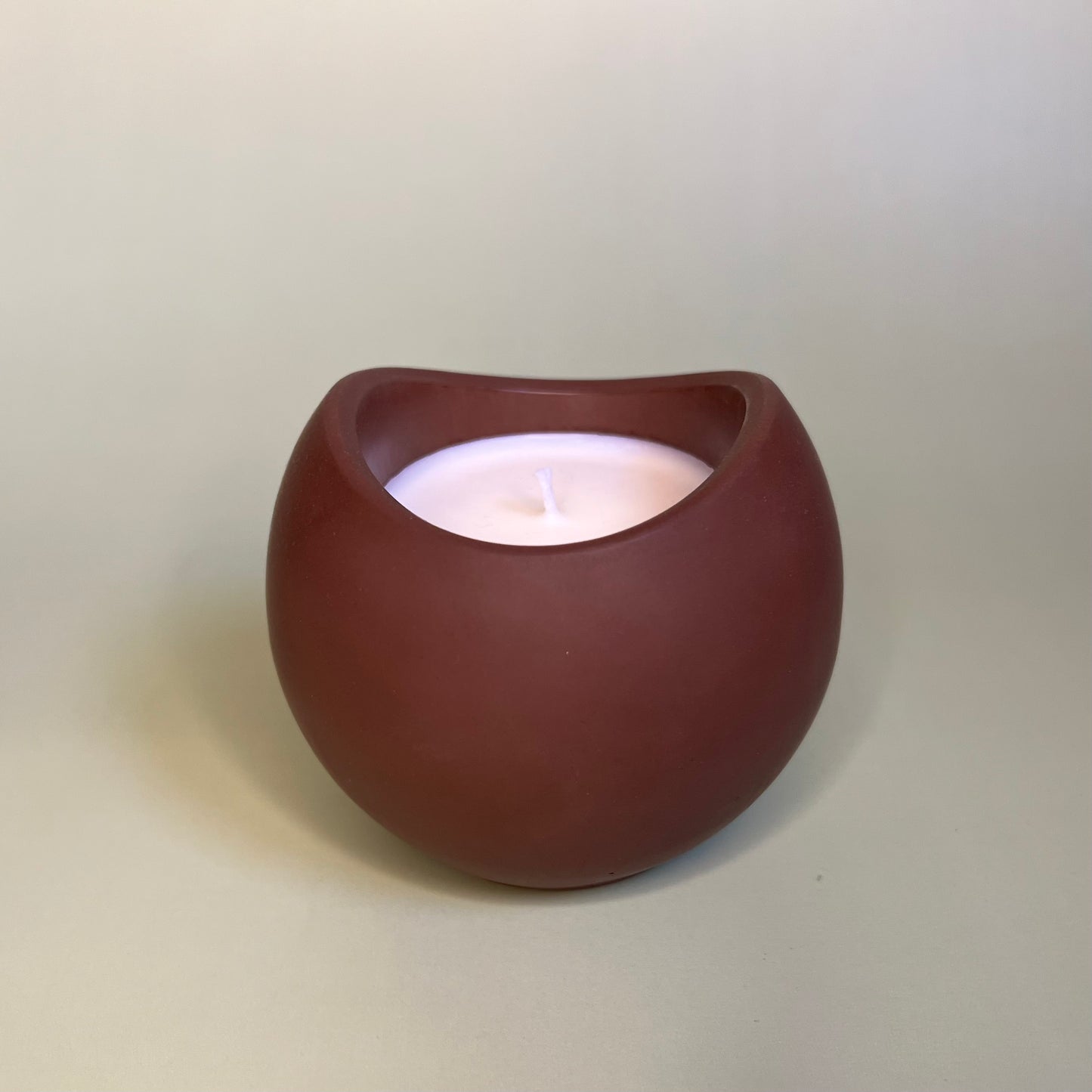 Candle in a Wave Shaped Container