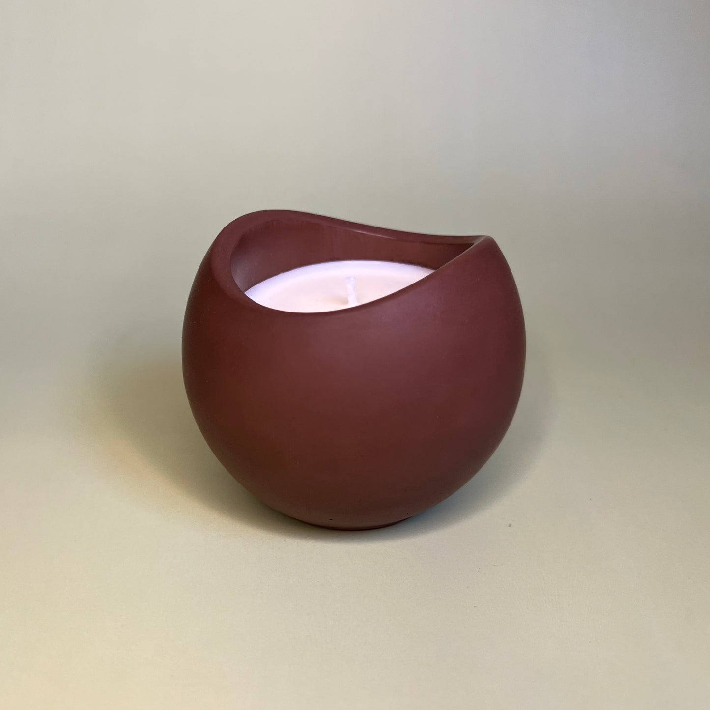 Candle in a Wave Shaped Container