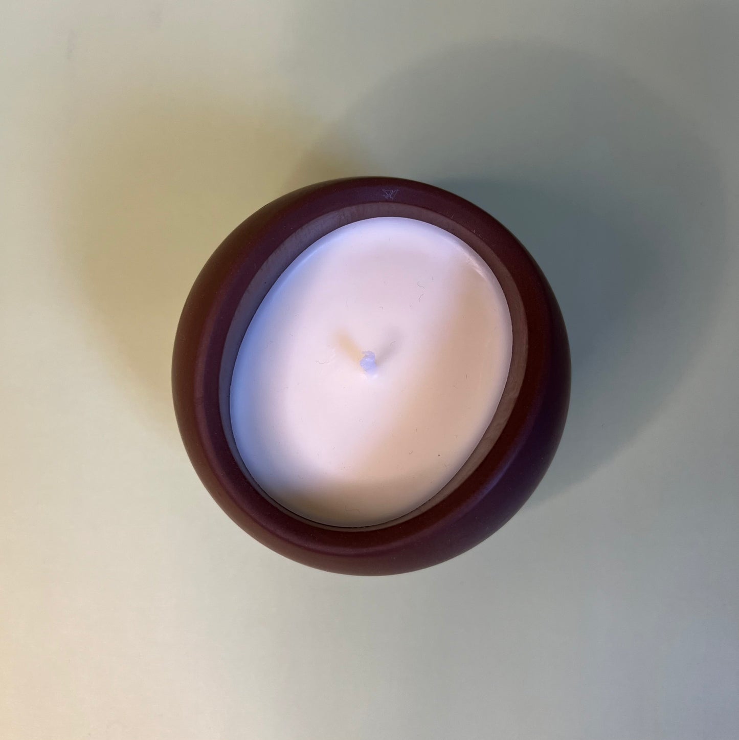 Candle in a Wave Shaped Container