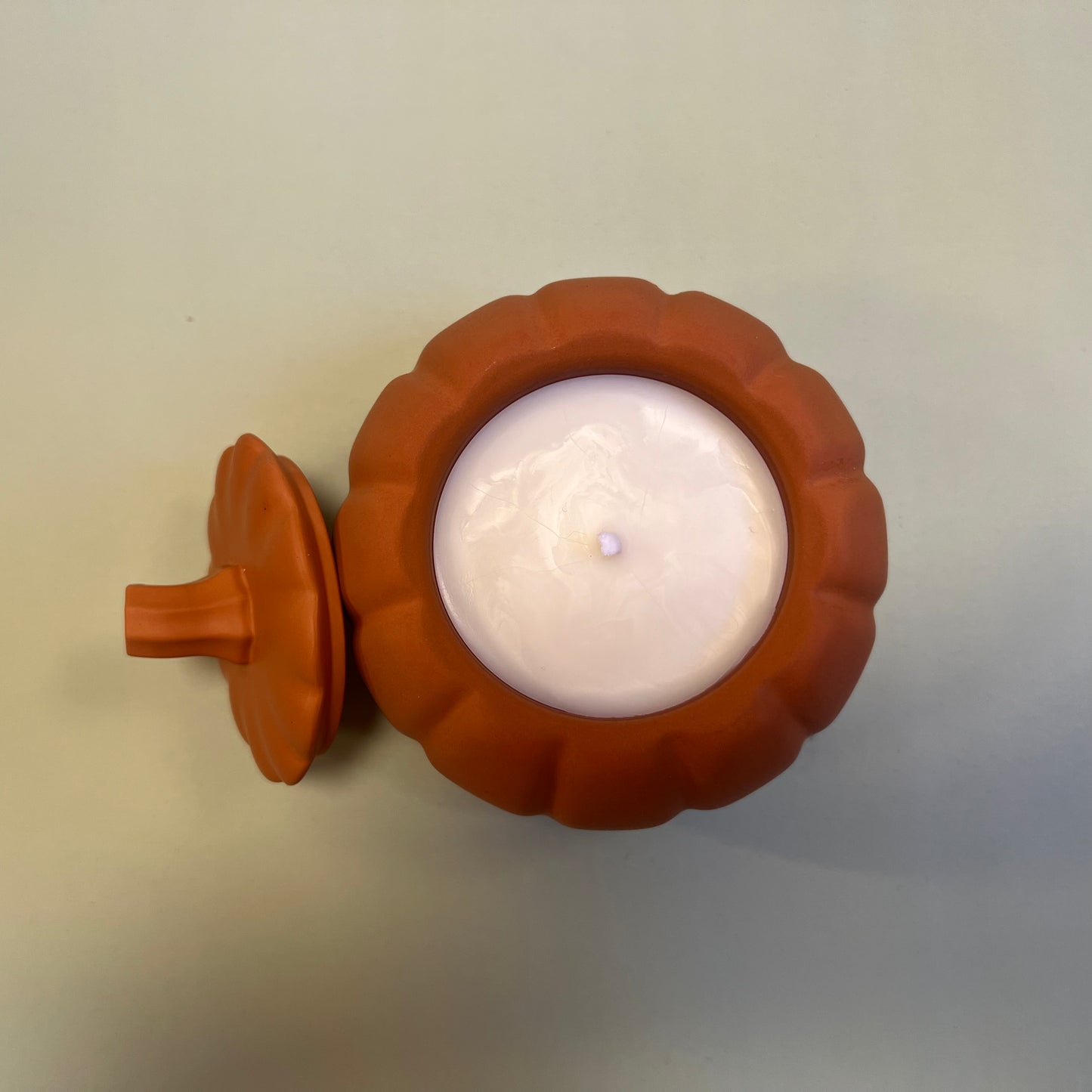 Pumpkin Candle in Orange Container