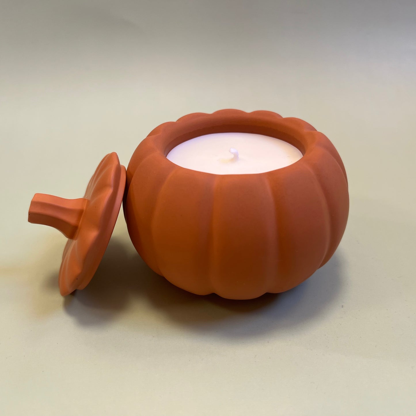 Pumpkin Candle in Orange Container