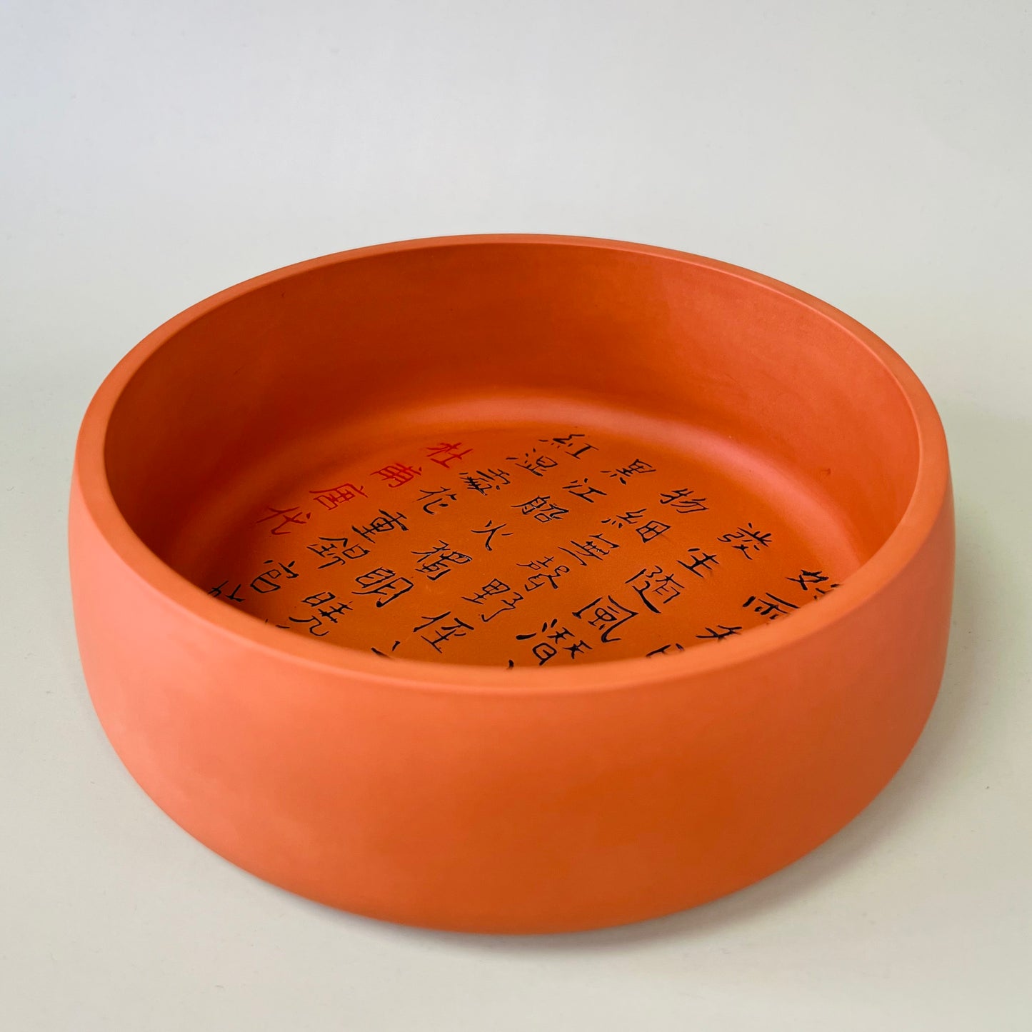 Artisan bowl featuring Chinese characters (Du Fu’s poem)