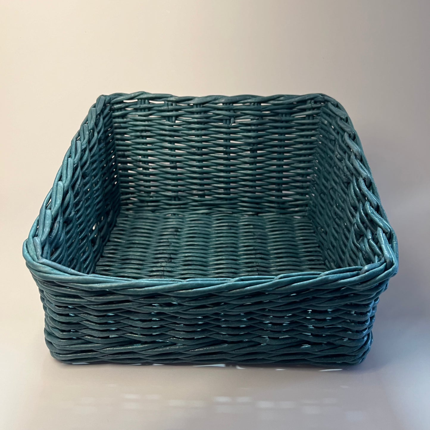 Beautiful Petrol-colored basket, a deep blue-green shade.