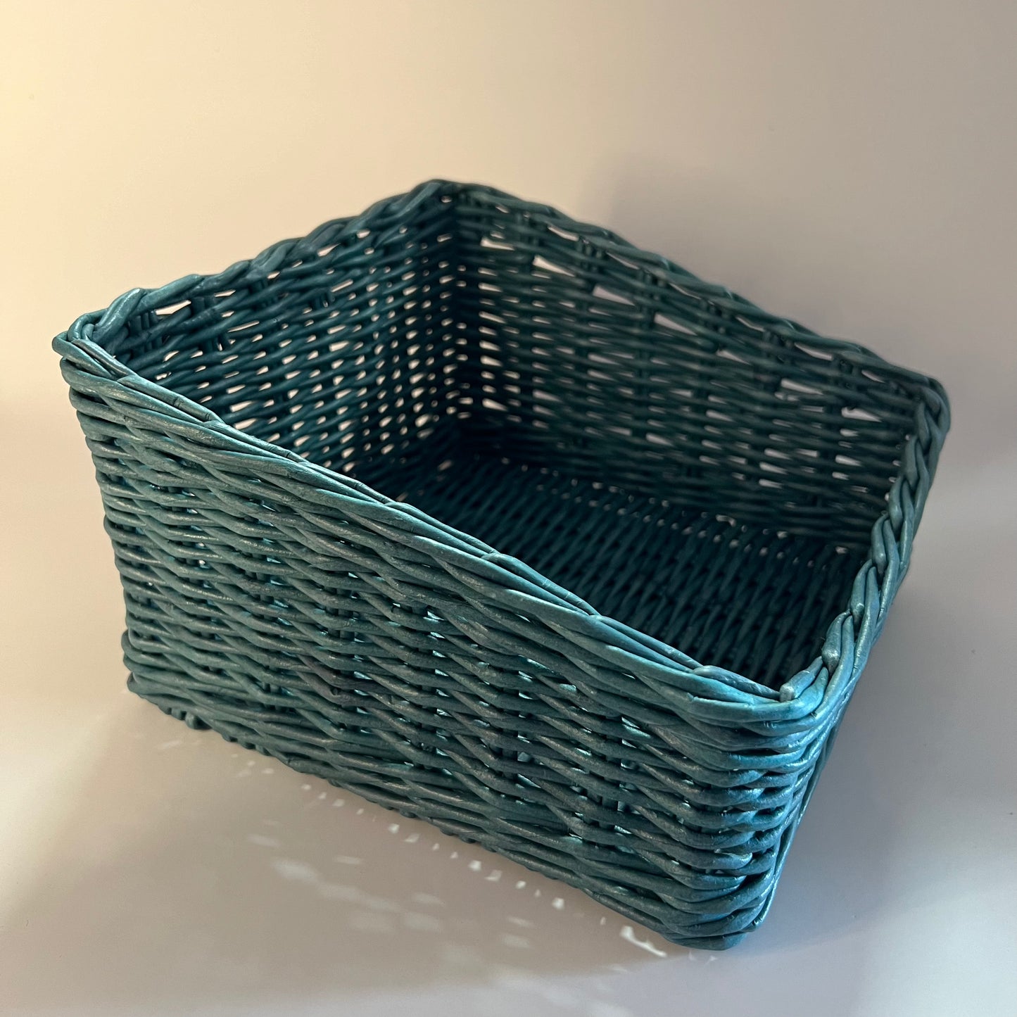 Beautiful Petrol-colored basket, a deep blue-green shade.